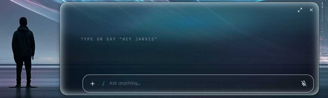 Jarvis's frameless command bar floating over the desktop at dusk, ready for a voice or typed request